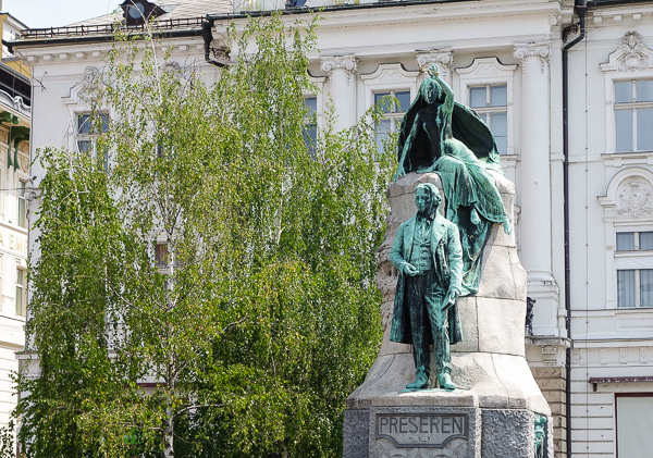 The Poet and his muse, and the tree planted in order to shield church-goers from the bare-chested muse.