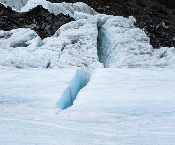 The start of a crevasse in the glacier. 