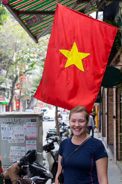 Sarah modeling with the Vietnamese flag. 