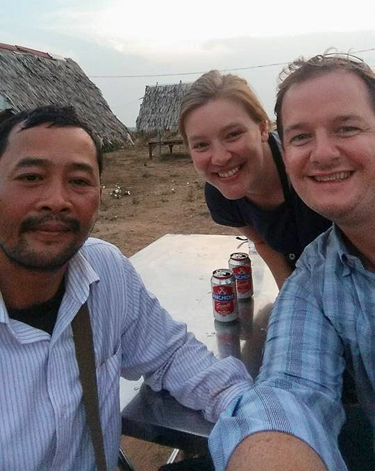 A grainy sunset selfie that we took with our tuk-tuk driver Leangseng in Kampong Chhnang, Cambodia. 